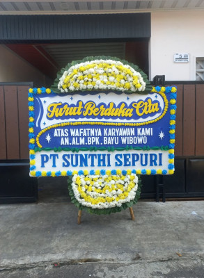 Papan Bunga Duka di Asuhan
