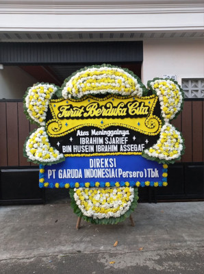 Papan Bunga Duka di Asuhan